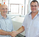 Zalman Orlianski from Zetech (on the left) hands over the new equipment to Robert Petrovski, Deman’s SMD manager.